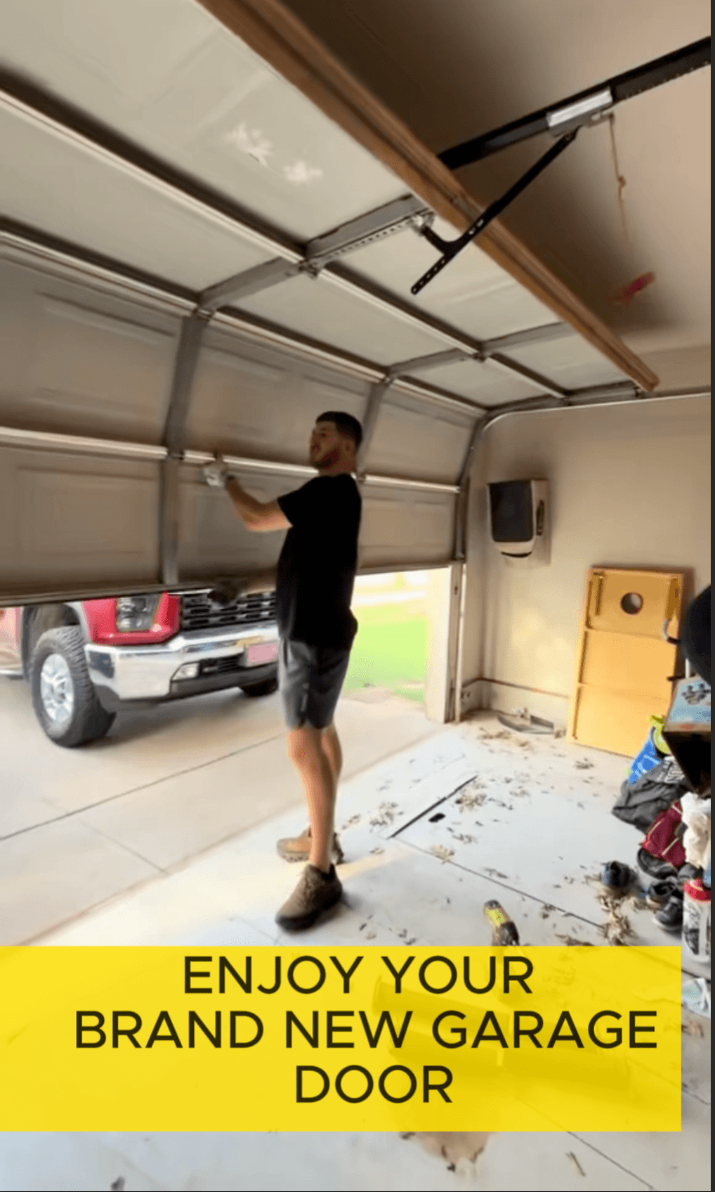Fixed garage door opening smoothly after spring replacement by Open Sesame Garages