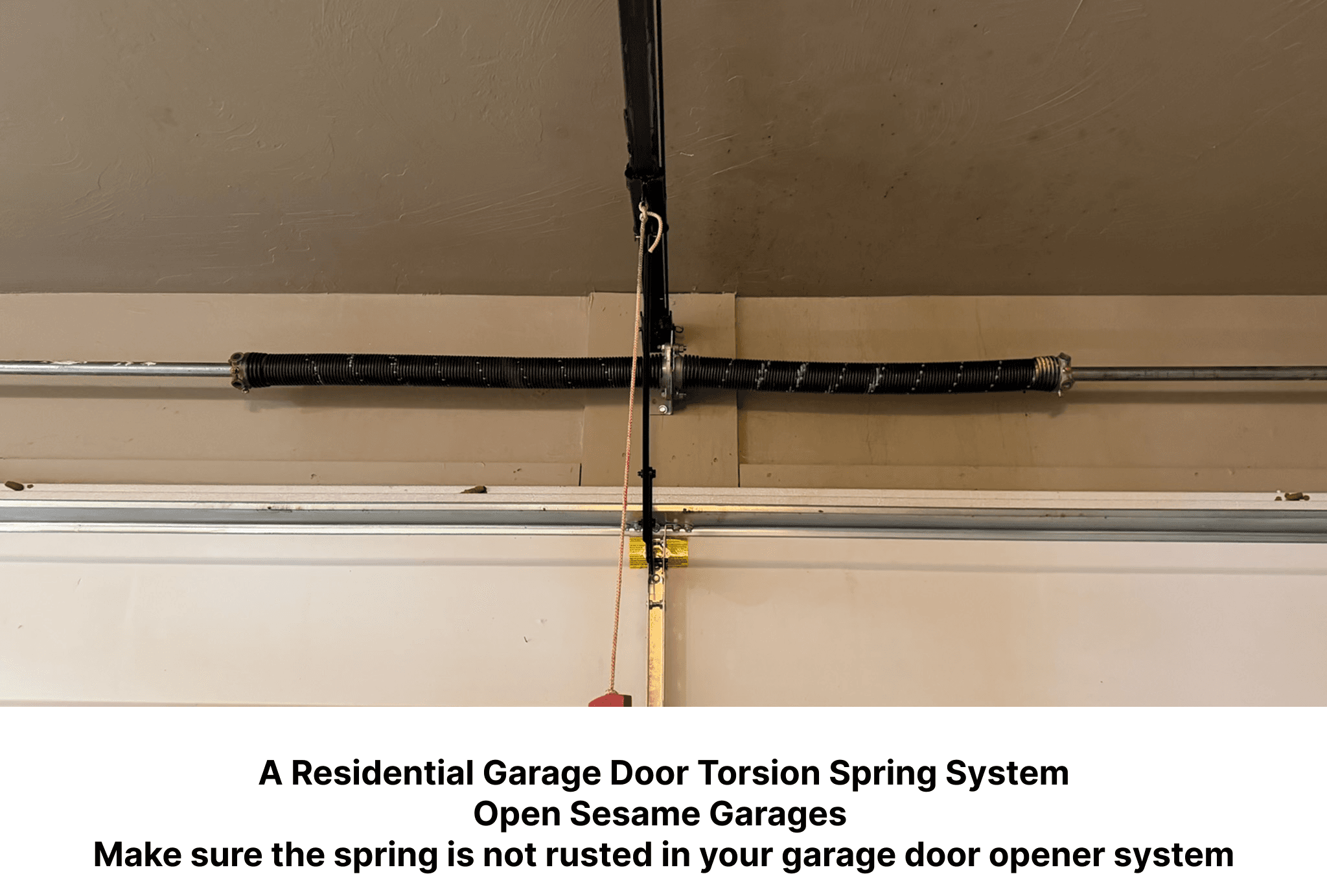 Torsion spring system above a residential garage door in Oklahoma City